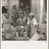 Migrant cotton pickers at lunchtime. Near Radstown, Texas