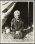 Grandmother of twenty-two children, from a farm in Oklahoma; eighty years old. Now living in camp on the outskirts of Bakersfield, California. "If you lose your pluck you lose the most there is in you - all you've got to live with"