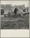American River camp, Sacramento. Home of Tennessee family, now migratory workers. Seven in family, came to California July 1935, following relatives who had come in 1933. Father was a coal miner in Tennessee