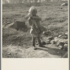 Daughter of a migrant fruit worker. American River camp outside of Sacramento, California