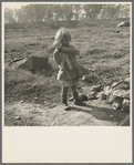 Daughter of a migrant fruit worker. American River camp outside of Sacramento, California