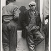 Waiting for the semimonthly relief checks at Calipatria, Imperial Valley, California. Typical story: fifteen years ago they owned farms in Oklahoma. Lost them through foreclosure when cotton prices fell after the war. Became tenants and sharecroppers