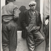 Waiting for the semimonthly relief checks at Calipatria, Imperial Valley, California. Typical story: fifteen years ago they owned farms in Oklahoma. Lost them through foreclosure when cotton prices fell after the war. Became tenants and sharecroppers