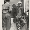 Waiting for the semimonthly relief checks at Calipatria, Imperial Valley, California. Typical story: fifteen years ago they owned farms in Oklahoma. Lost them through foreclosure when cotton prices fell after the war. Became tenants and sharecroppers