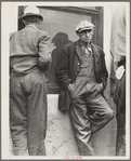 Waiting for the semimonthly relief checks at Calipatria, Imperial Valley, California. Typical story: fifteen years ago they owned farms in Oklahoma. Lost them through foreclosure when cotton prices fell after the war. Became tenants and sharecroppers