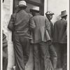 Waiting for the semi-monthly relief checks at Calipatria, California
