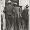 Waiting for the semi-monthly relief checks at Calipatria, California