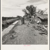 Ditch bank housing for Mexican field workers. Imperial Valley, California