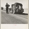 Southern California desert. Migrant from Chickasaw, Oklahoma, stalled on the desert in southern California with no money. He and his ten children are facing future in California