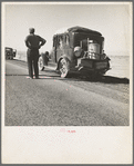 Southern California desert. Migrant from Chickasaw, Oklahoma, stalled on the desert in southern California with no money. He and his ten children are facing future in California