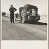 Southern California desert. Migrant from Chickasaw, Oklahoma, stalled on the desert in southern California with no money. He and his ten children are facing future in California