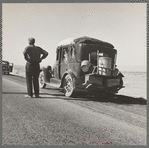 Southern California desert. Migrant from Chickasaw, Oklahoma, stalled on the desert in southern California with no money. He and his ten children are facing future in California