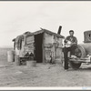 Migratory Mexican field worker's home on the edge of a frozen pea field. Imperial Valley, California