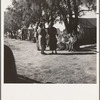 Sunday school for migrant children in a potato pickers' camp. Kern County, California