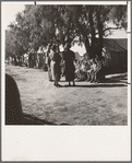 Sunday school for migrant children in a potato pickers' camp. Kern County, California