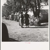 Sunday school for migrant children in a potato pickers' camp. Kern County, California