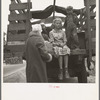 Family of ex-sharecroppers from Arkansas, near Little Rock, on California highway. Tehachapi grade