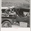 Family of drought refugees on U.S. 99 near Bakersfield, California