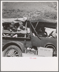 Family of drought refugees on U.S. 99 near Bakersfield, California