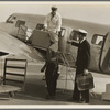 Unloading baggage for inspection after arrival of plane from Mexico. Glendale Airport, California