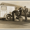 Plant quarantine inspector examining baggage brought into the United States by plane from Mexico. Glendale, California