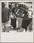 El Paso housewives after a day's shopping in Juarez, Mexico where they benefit by the rate of exchange. Texas