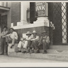 On the steps of the bank in the public square. Memphis, Texas