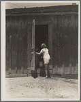 Child of Texas sharecropper carrying water