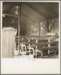 "Assembly of God" in tent by the roadside, Cache County [?], Oklahoma. Twenty- nine attend this church. Eighteen families of displaced laborers and tenants encamp in this group along the highway