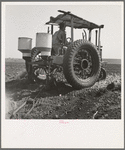 Tractor and operator. Navarro, Texas