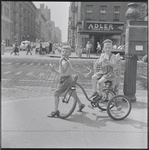 Boys on tricycle. New York, NY