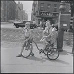 Boys on tricycle. New York, NY