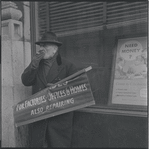 Man smoking a cigarette. New York, NY