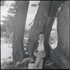 Sima Huberland seated under a tree