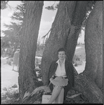 Sima Huberland seated under a tree