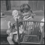 Girl with doll