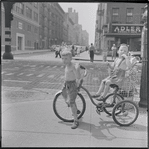 Boys on tricycle. New York, NY