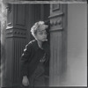 Child standing in a doorway. New York, NY