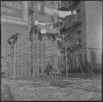 Boys playing on monkey bars. New York, NY
