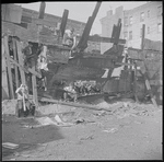 Children in a dilapidated lot. New York, NY