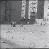 Boys playing in empty lot. New York, NY