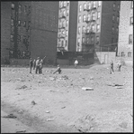 Boys playing in empty lot. New York, NY