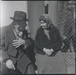 Man and woman conversing. New York, NY