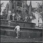 Children playing in fountain