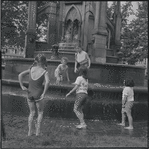 Children playing in fountain