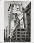 "No Glove No Love" of a voluptuous blond painted by Mike McNeilly on a large billboard advertisement on 315 Park Avenue?