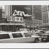 U.S. Armed Forces Recruiting Center, model for Calvin Klein Underwear billboard advertisment and a limo car in the foreground in Times Square