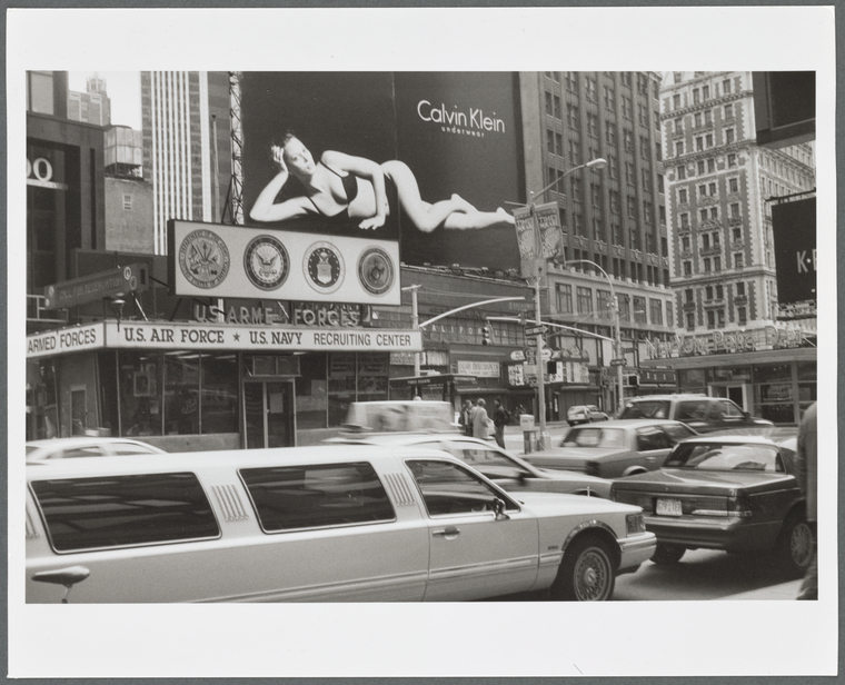 . Armed Forces Recruiting Center, model for Calvin Klein Underwear  billboard advertisment and a limo car in the foreground in Times Square -  NYPL Digital Collections