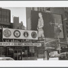 U.S. Armed Forces Recruiting Center and Kate Moss for Calvin Klein Jeans billboard advertisement in Times Square