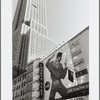 Silvertab billboard advertisement next to Sbarro signage in Times Square area
